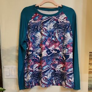 Reel Legends Teal Raglan Long Sleeve Fishing Top with Multicolor Abstract Front